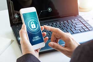 man viewing phone with cyber security in place