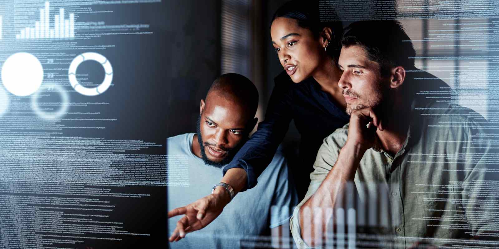 A team of three professionals collaborating over a computer screen overlaid with code and data visualizations, representing cybersecurity project management and analysis
