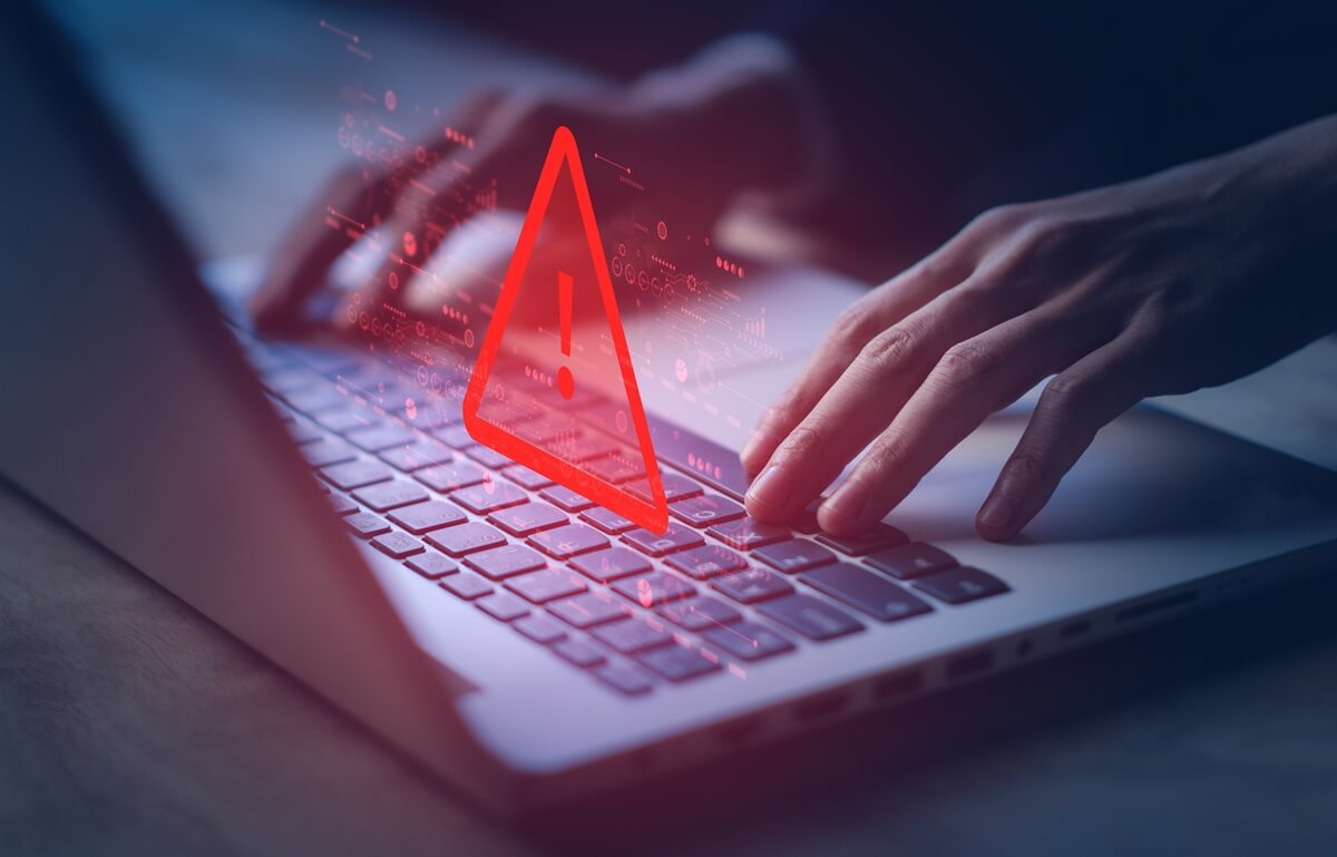 system hacked warning alert on notebook