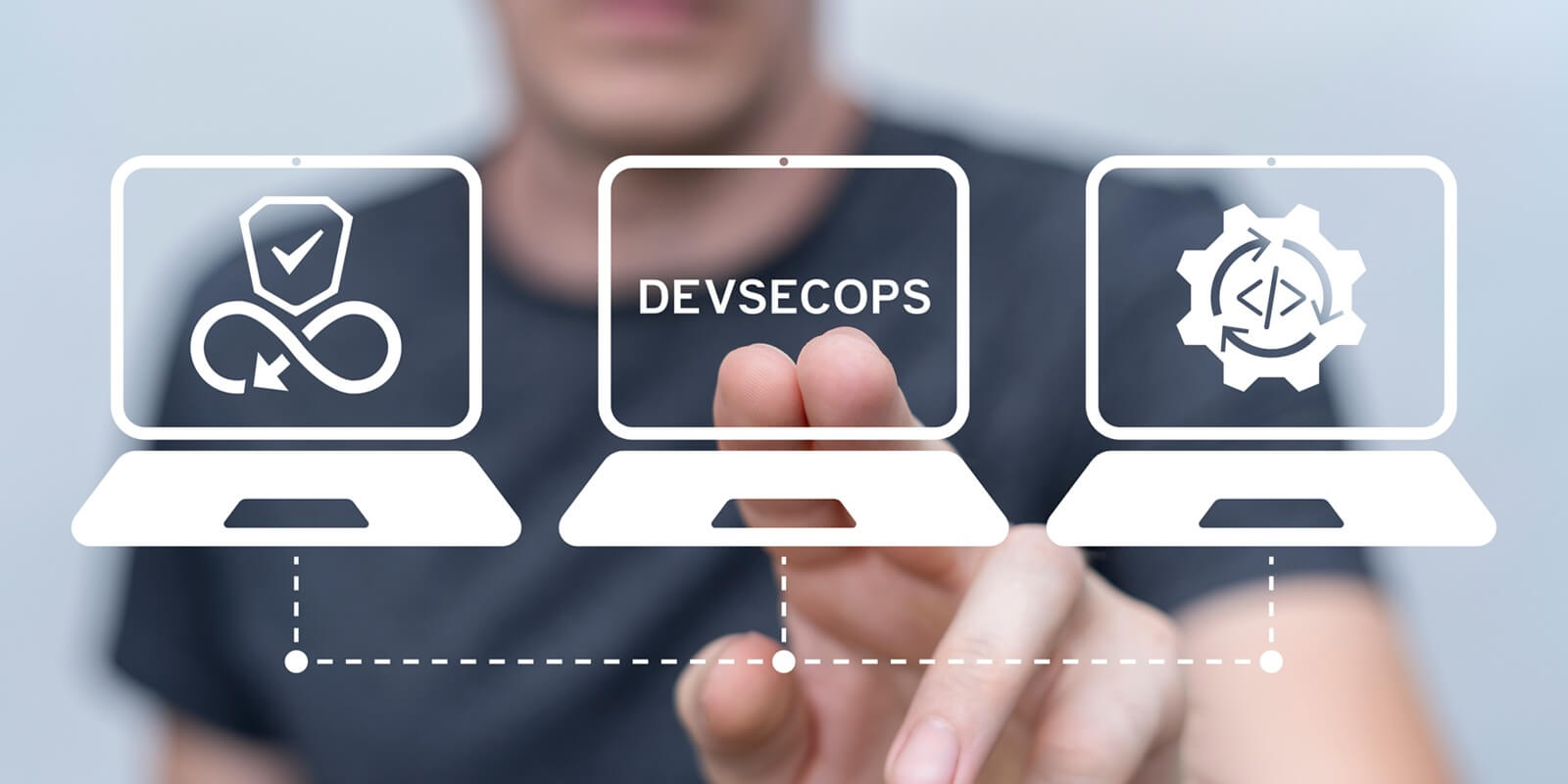 man using virtual touch screen presses the text DEVSECOPS