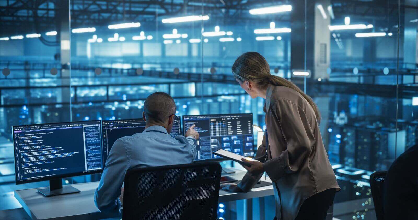 male engineer and female team leader collaborate on a project